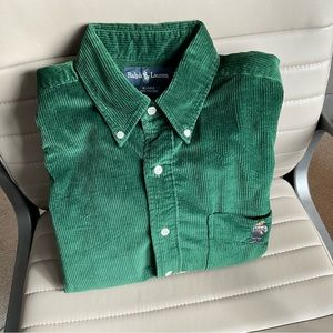 Polo by Ralph Lauren shirt with iconic bear embroidered on pocket.